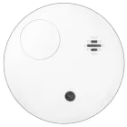 White circular smoke detector with a small light and testing button.